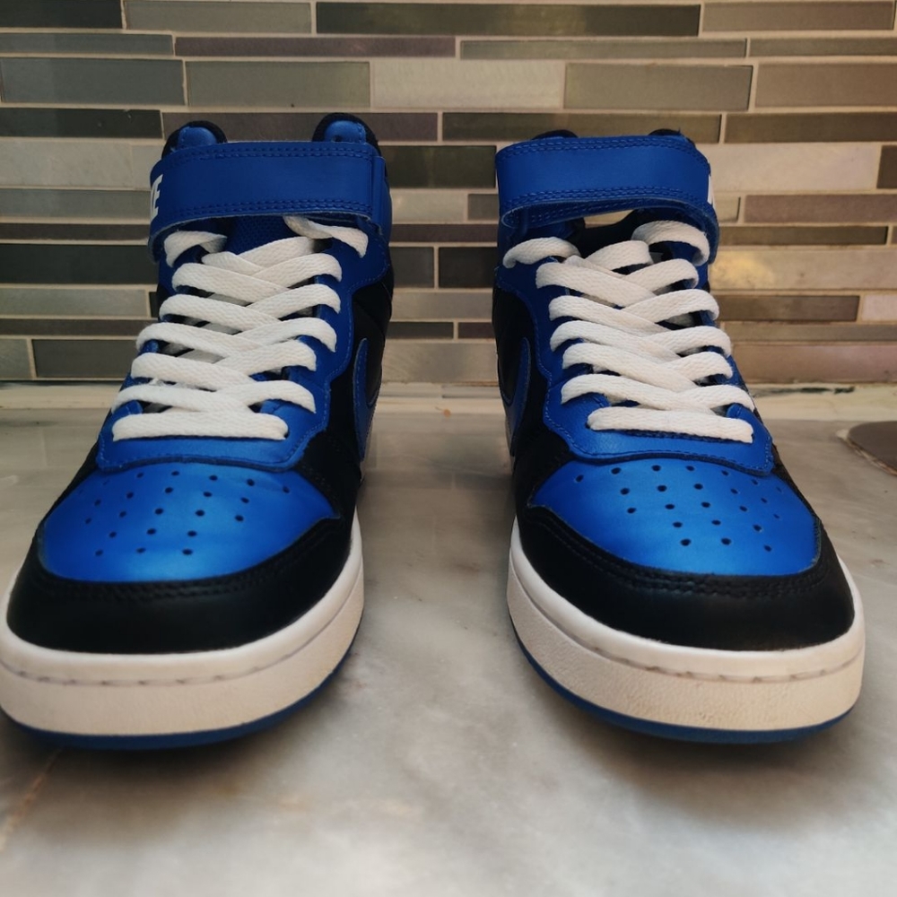 Shoe: Nike court burough. Size 5.5 boys. Color: Blue/white/black